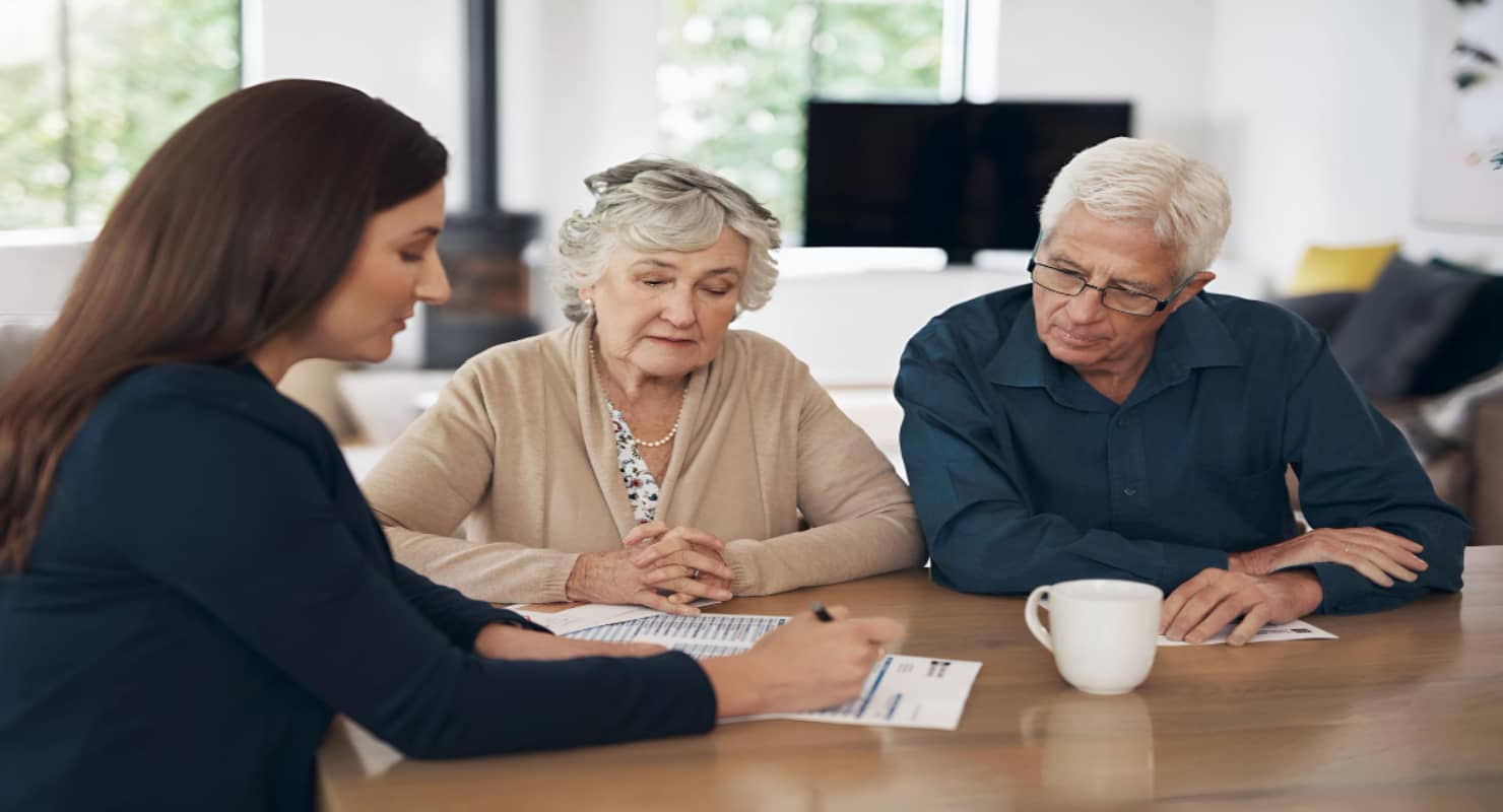 Investment senior couple and meeting with a financial advisor lawyer or woman consulting